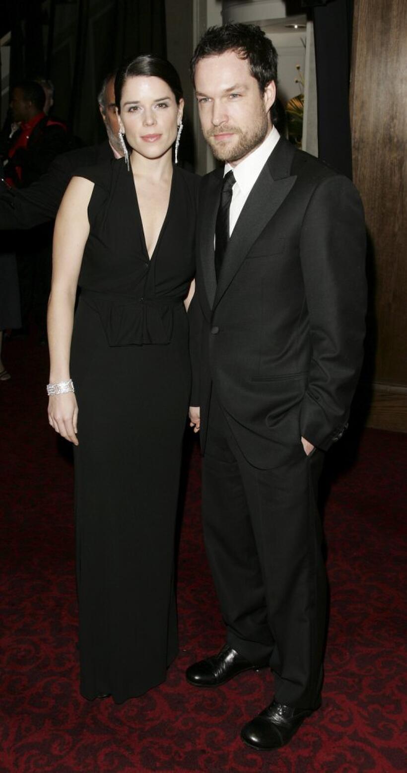 Neve Campbell and John Light at the after show party of Official BAFTA.