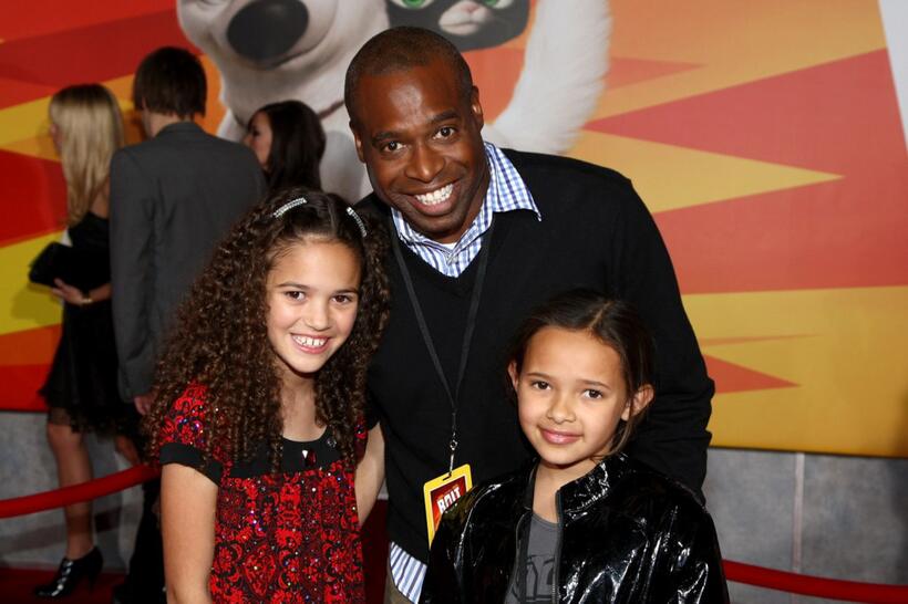 Madison Pettis, Phill Lewis and guest at the premiere of "Bolt."