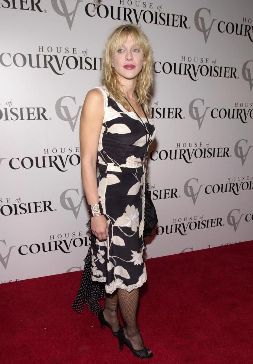 Courtney Love at the fashion show of designer Jeremy Scott's collection "S/S 01."