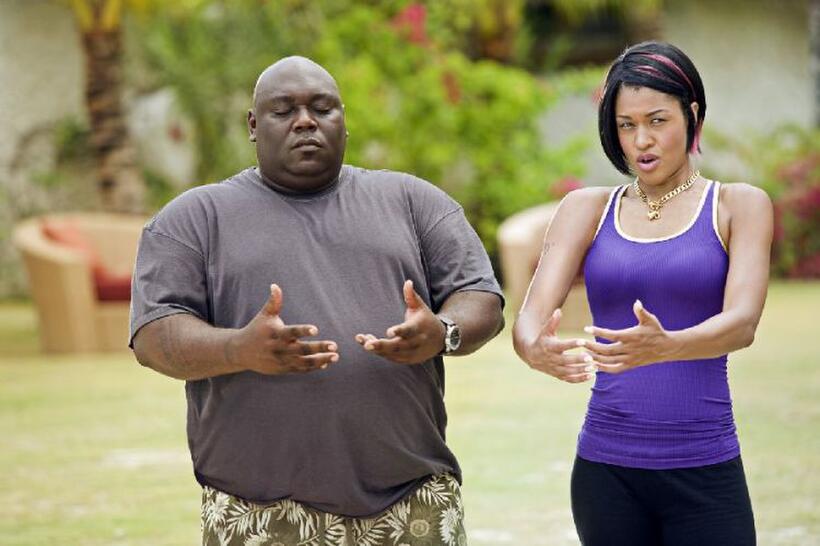 Faizon Love as Shane and Kali Hawk as Trudy in "Couples Retreat."