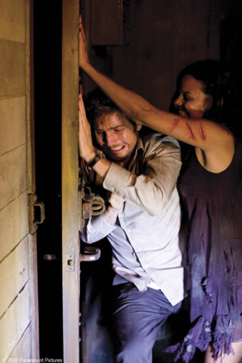 Michael Stahl-David and Jessica Lucas in "Cloverfield."