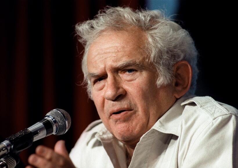 Norman Mailer at a press conference as member of the jury of the 40th Cannes film festival.