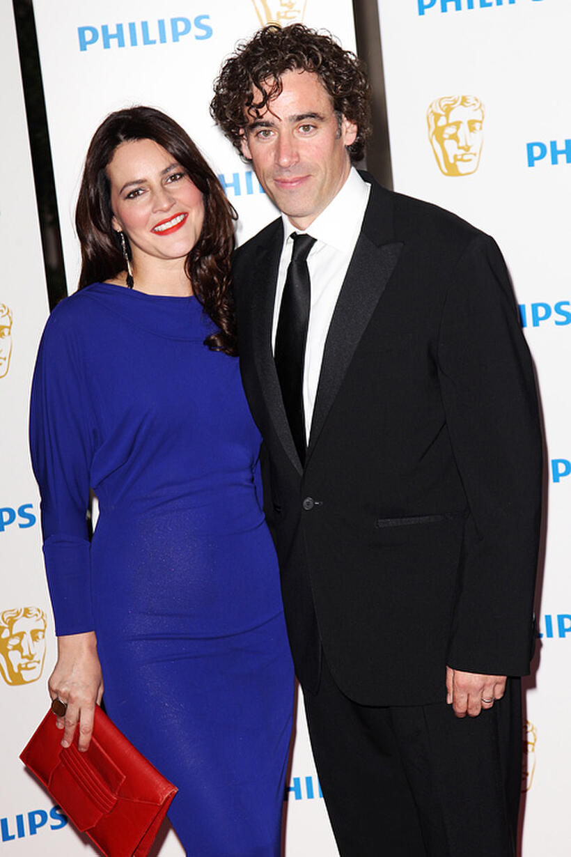Stephen Mangan and Guest at the Phillips British Academy Awards 2011 in London.