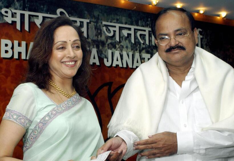Hema Malini and Venkaiah Naidu at the function at BJP headquarters in New Delhi.