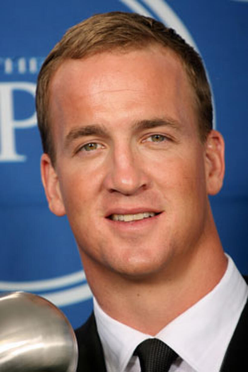NFL player Peyton Manning poses for photos in the press room after winning the award for 'Best Championship Performance' during the 2007 ESPY Awards at the Kodak Theatre. 