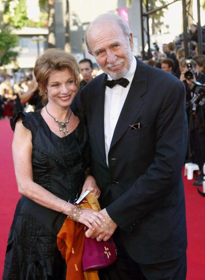 Jean-Pierre Marielle and Guest at the screening of "Mystic river" during the 56th Cannes Film Festival.