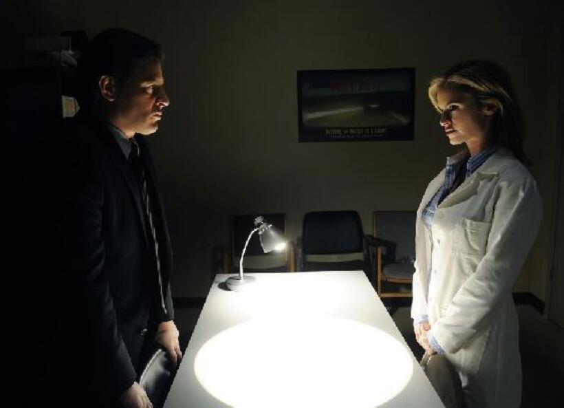 Costas Mandylor as Hoffman and Betsy Russell as Jill in "Saw VI."