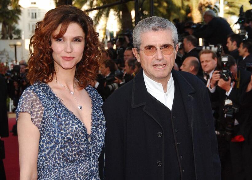Claude Lelouch and his wife Alessandra Martines at the screening of "Swimming pool" during the 56th Cannes film festival.
