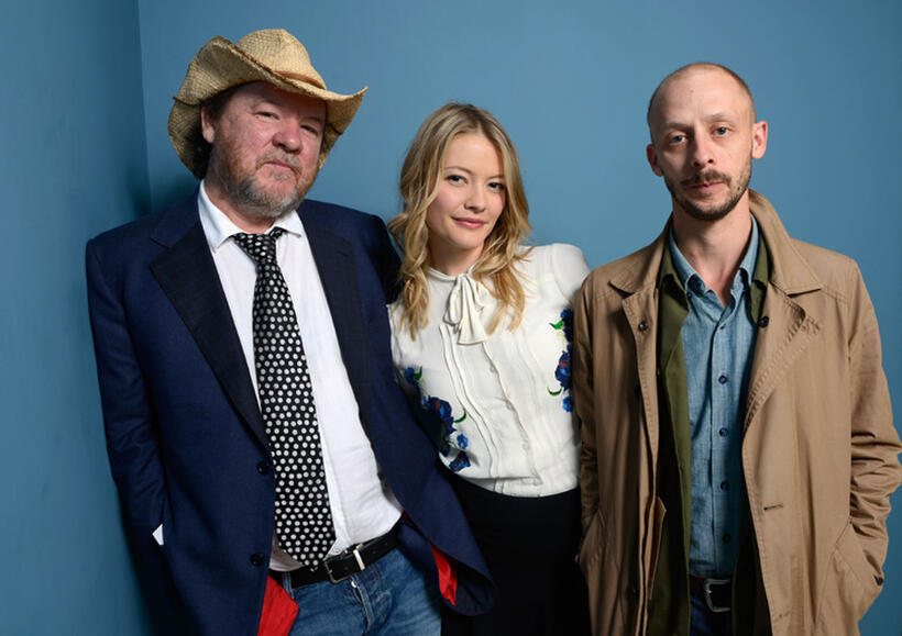 Director Bruce McDonald, Sarah Allen and Maxwell McCabe-Lokos at the portrait studio during the 2013 Toronto International Film Festival.