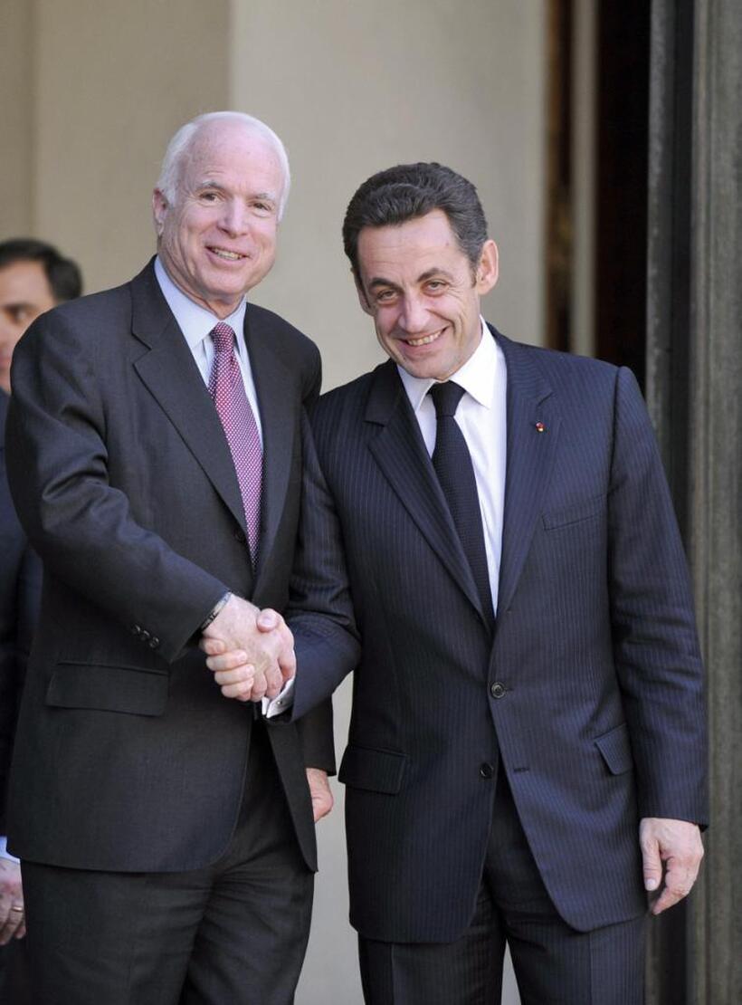 John McCain and Nicolas Sarkozy at the Elysee Palace.