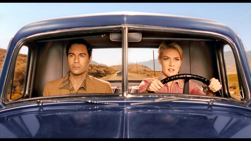 Eric McCormack as Ted Lewis and Jenni Baird as Tammy in "Alien Trespass."