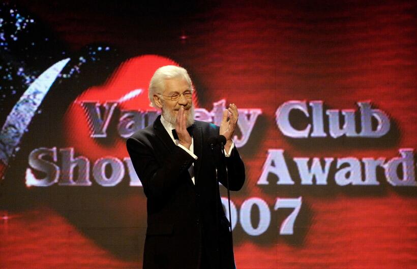 Sir Ian McKellen presents an award at the Variety Club Showbiz Awards.