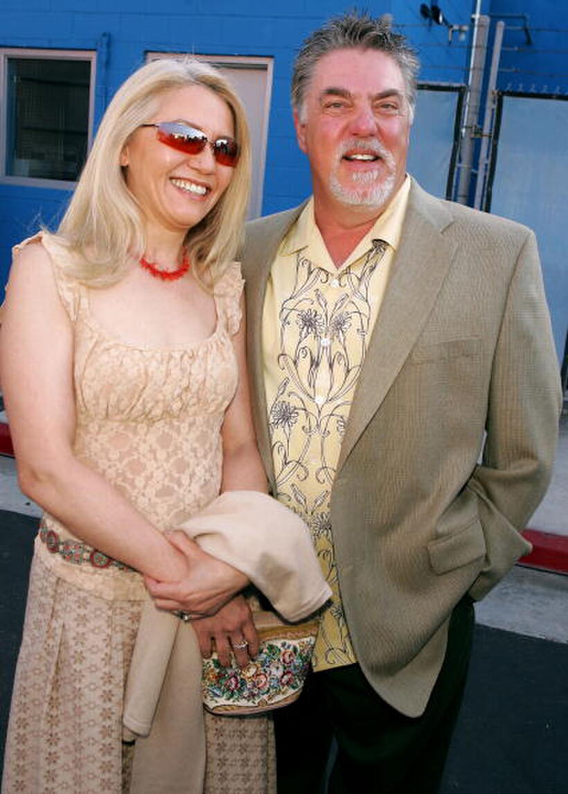 Bruce McGill and Guest at the premiere of "Cinderella Man."