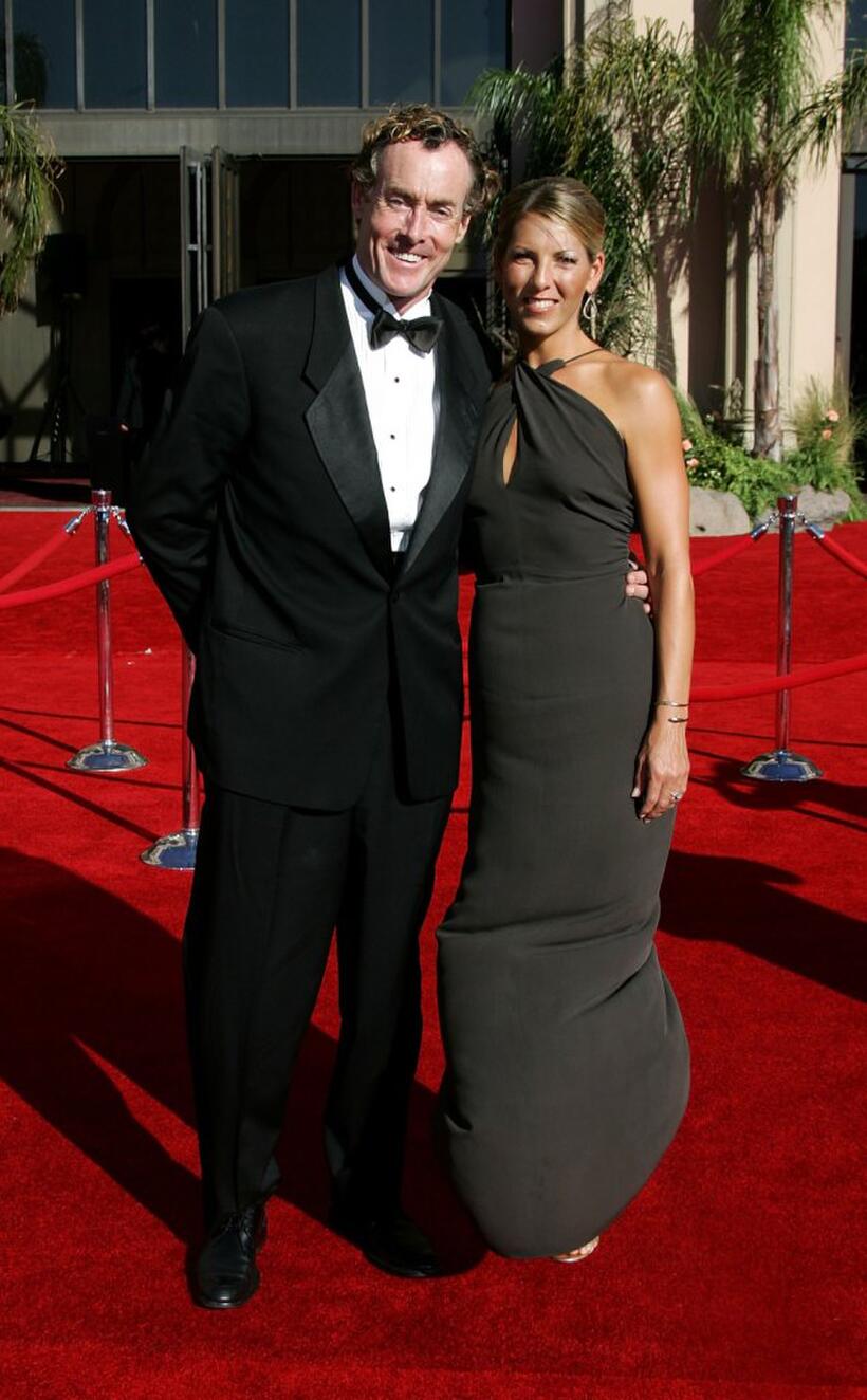 John C. McGinley and guest at the 58th Annual Primetime Emmy Awards.
