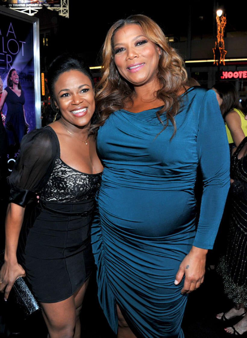Dequina Moore and Queen Latifah at the California premiere of "Joyful Noise."