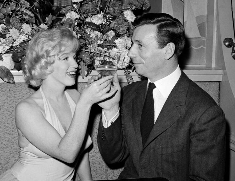Yves Montand and Marilyn Monroe at the screening of "Let's Make Love".
