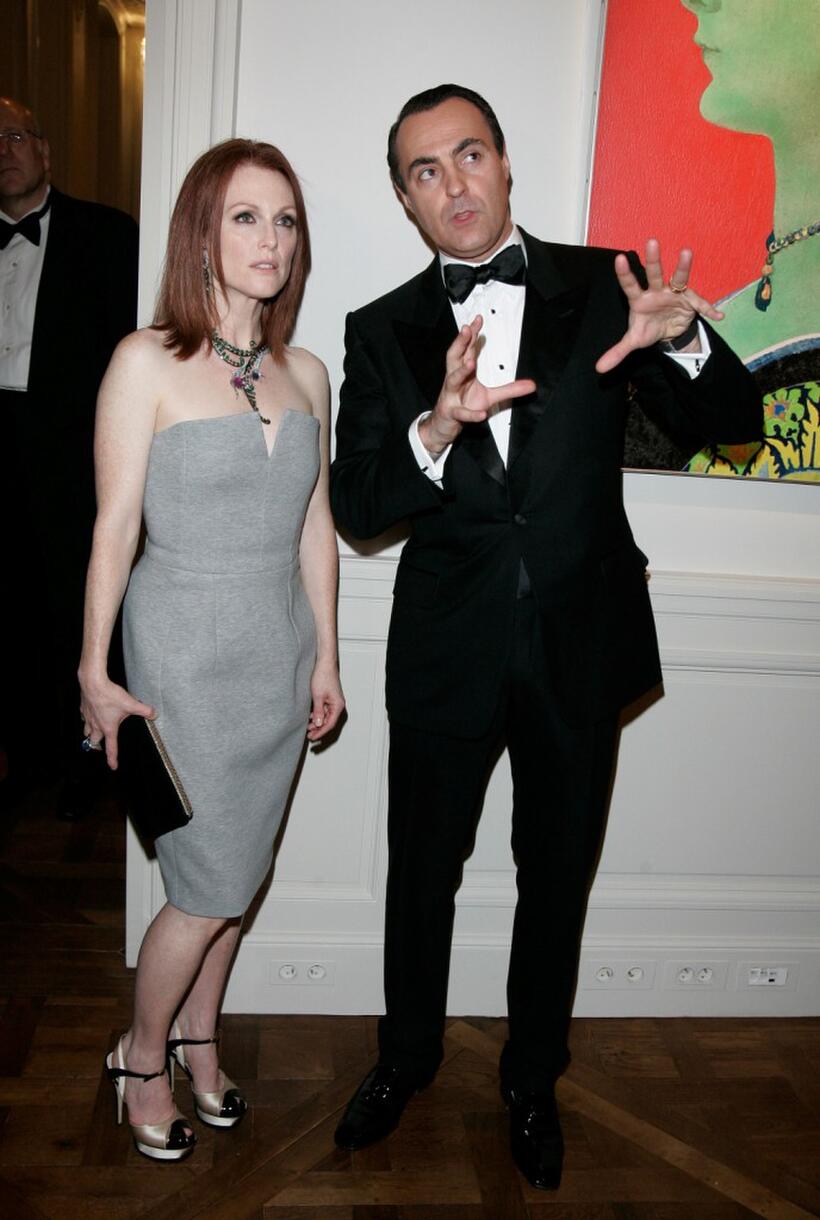 Julianne Moore and Jean Christophe Bedos at the cocktail reception for the 150th Anniversary dinner of Boucheron.