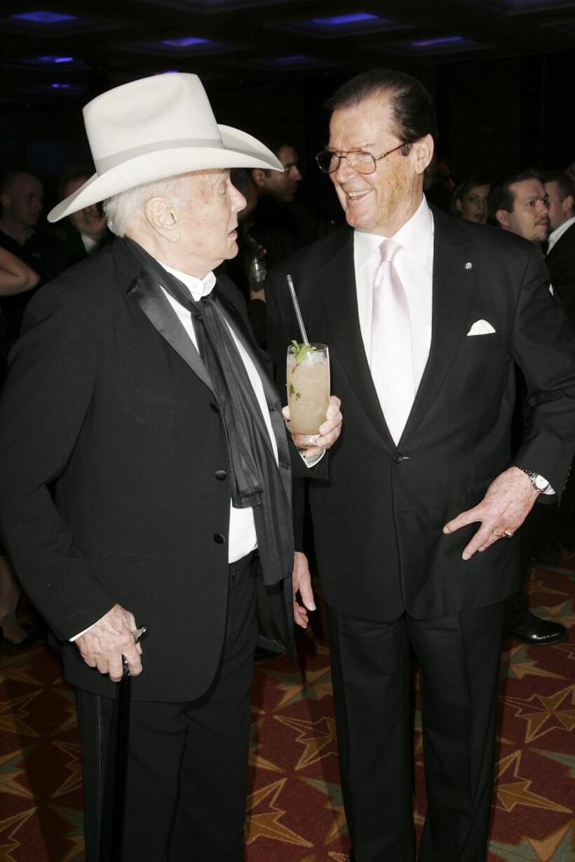 Roger Moore and Tony Curtis at the Sony Ericsson Empire Film Awards.