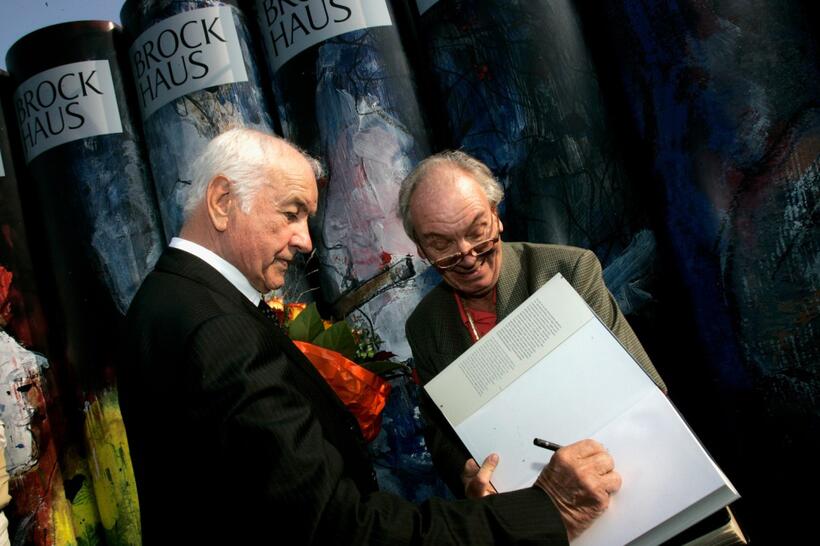 Armin Mueller-Stahl gives an autograph at the Frankfurt Book Fair.
