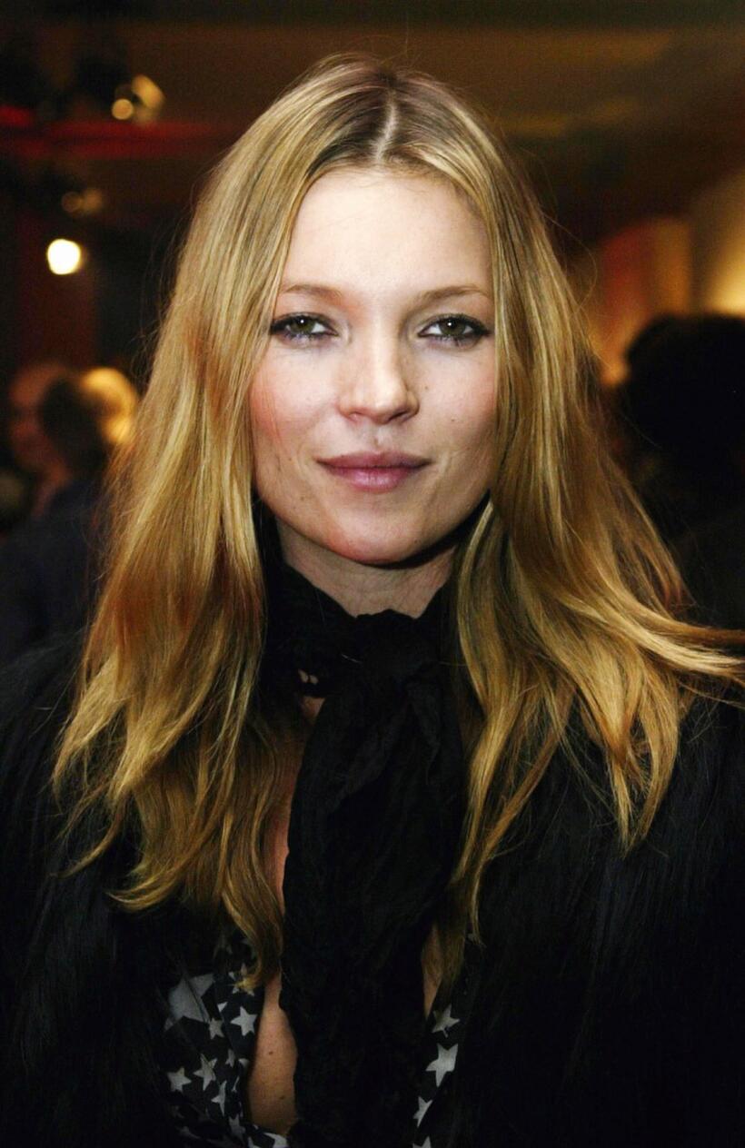 Kate Moss at the Canon private view of exhibition "On The Other Side Of The Lens."