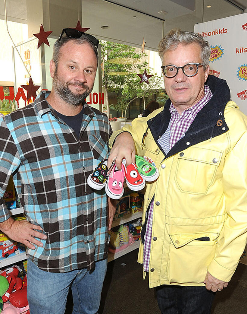 Mark Mothersbaugh and Guest at the Vans x Yo Gabba Gabba! shoe launch in California.