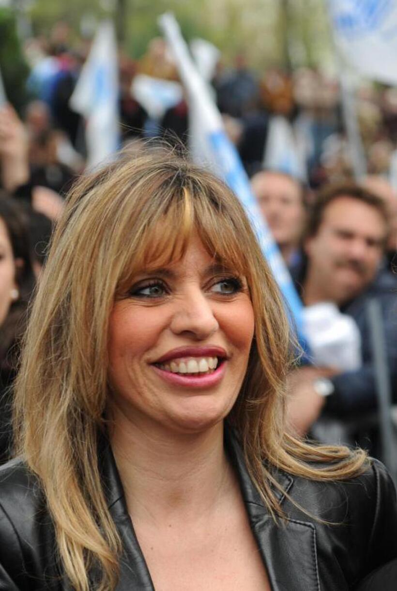 Alessandra Mussolini at the final campaign rally with Italy's conservative leader Silvio Berlusconi.