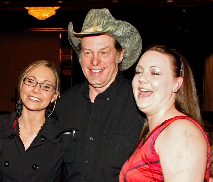 Jen Wall, Ted Nugent and Beth McPherson at the National Bowhunters Hall of Fame during the National Field Archery Association's World Archery Festival.