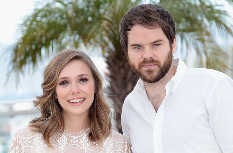 Elizabeth Olsen and director Sean Durkin at the photocall of "Martha Marcy May Marlene" during the 64th Annual Cannes Film Festival.