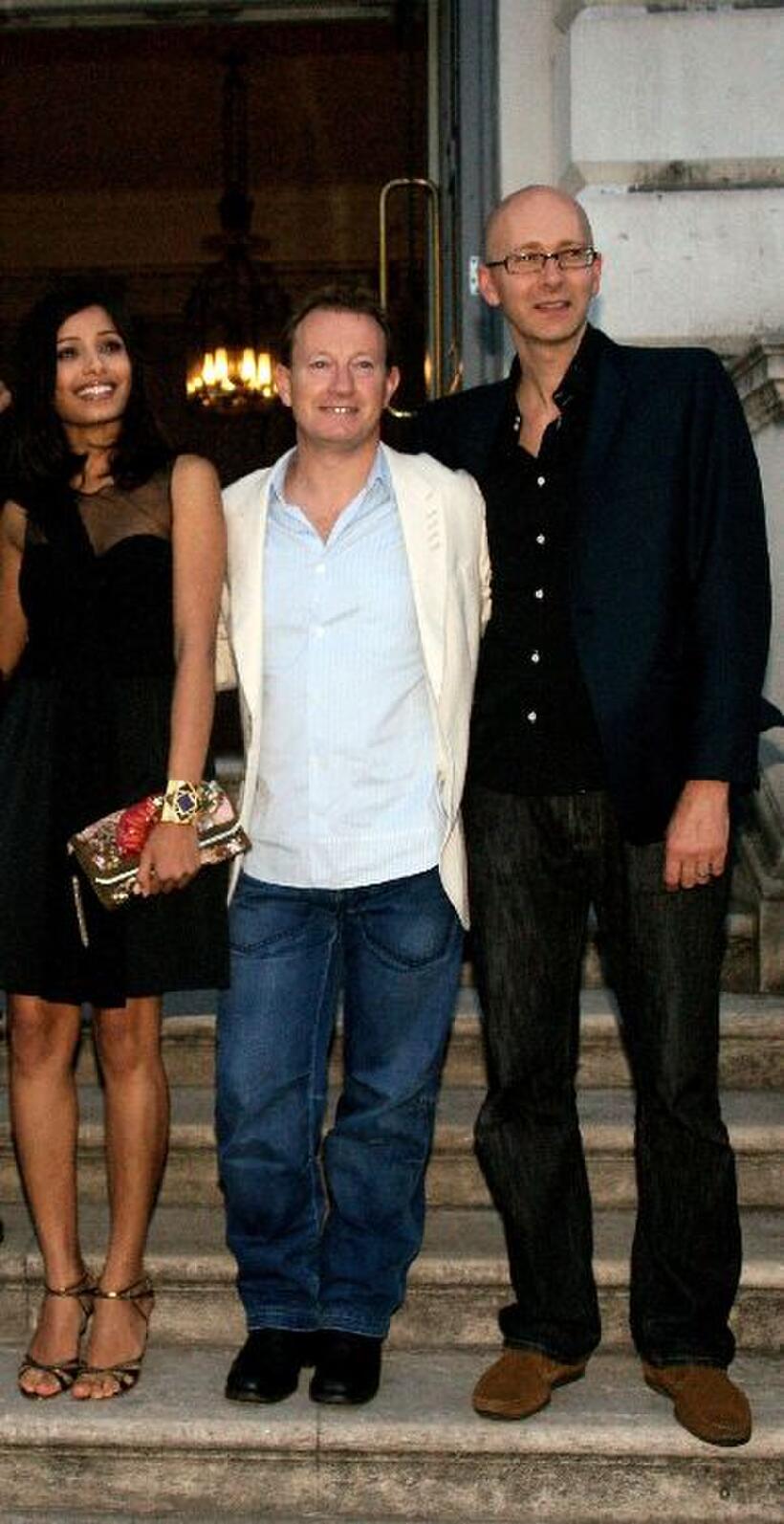 Freida Pinto, Simon Beaufoy and Chris Dickens at the Film4 Summer Screen in London.