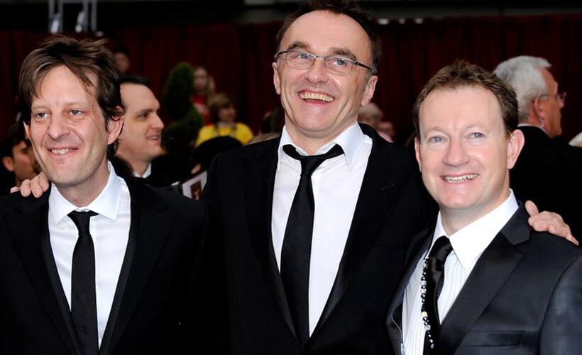 Producer Christian Colson, director Danny Boyle and Simon Beaufoy at the 81st Annual Academy Awards.
