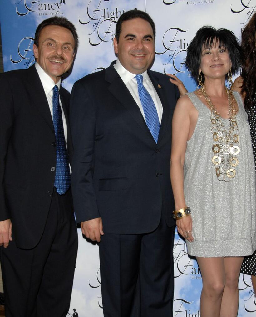 Dr. Ricardo E. Saca, Elias Antonio Saca Gonzalez and Dyana Ortelli at the cocktail party of "Flights of Fancy."