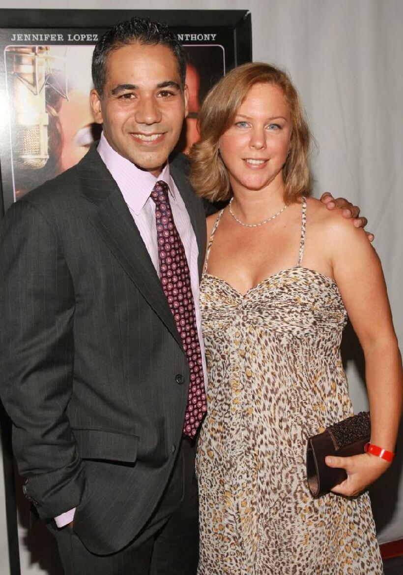 John Ortiz and guest at the premiere of "El Cantante."