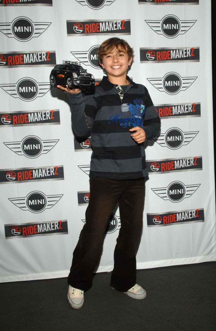 Jansen Panettiere at the Ridemakerz unveiling of a toy Mini to the Boys & Girls Club.