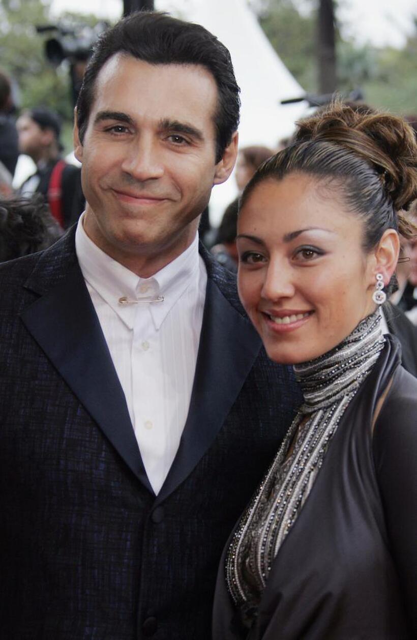 Adrian Paul and Guest at the screening of "Broken Flowers" during the 58th edition of the Cannes International Film Festival.