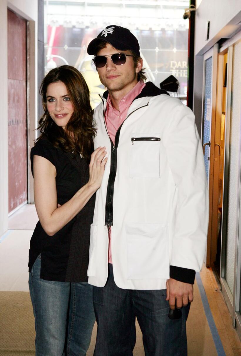 Amanda Peet and Ashton Kutcher at the MTV's Total Request Live.