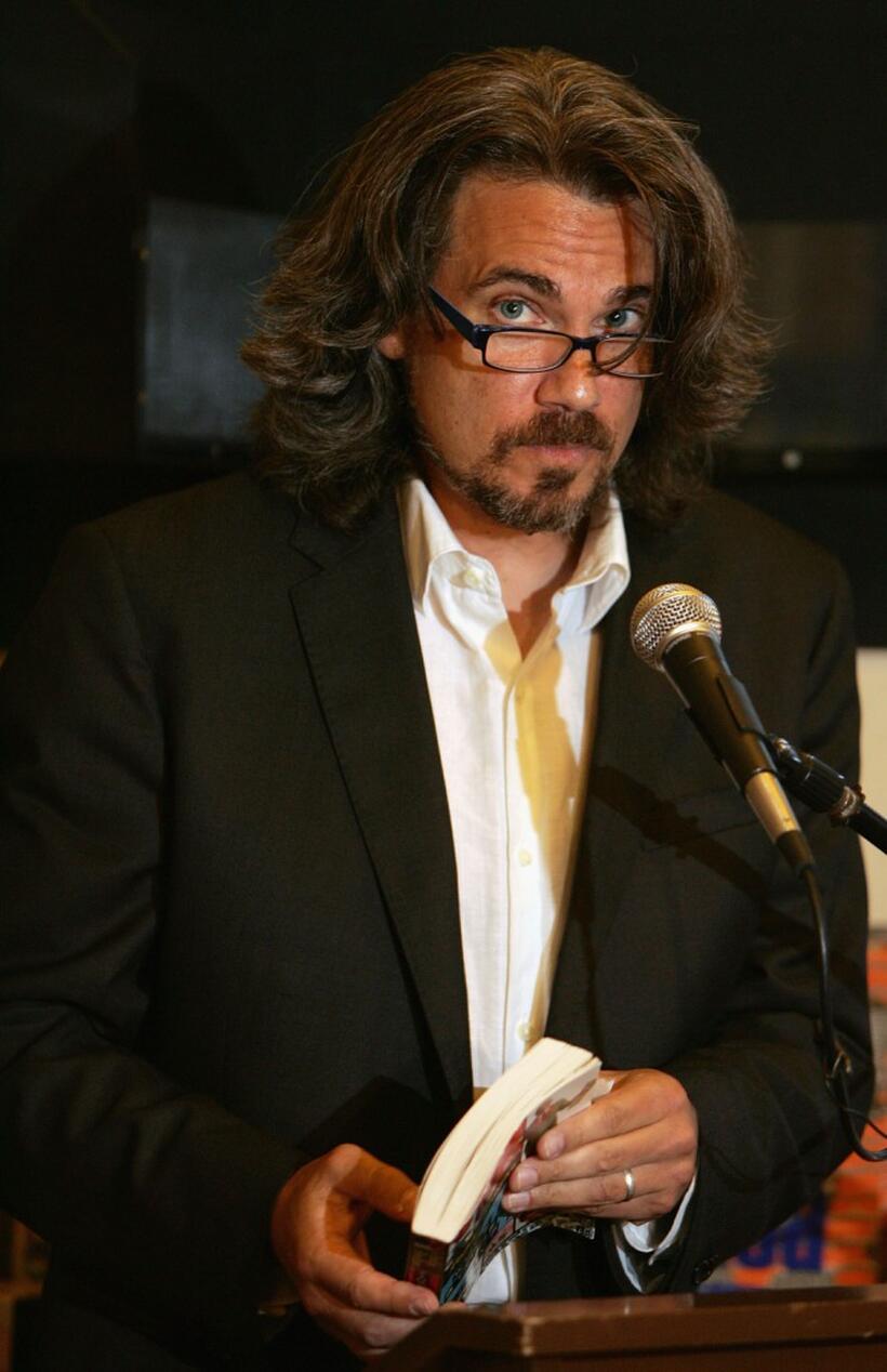 Robby Benson talking to an audience and signing copies of his new book "Who Stole The Funny A Novel of Hollywood".