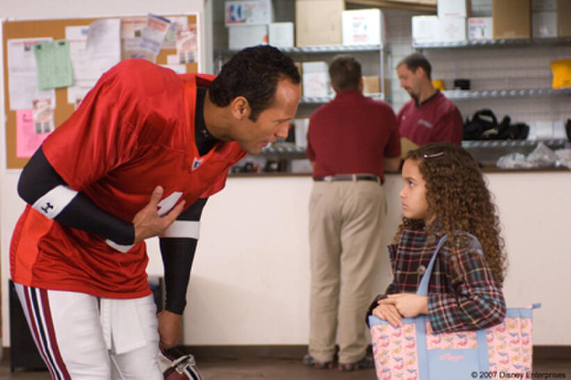 The Rock and Madison Pettis in "The Game Plan."