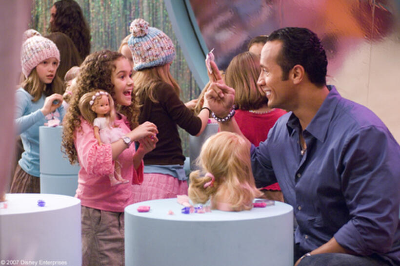 Madison Pettis and The Rock in "The Game Plan."