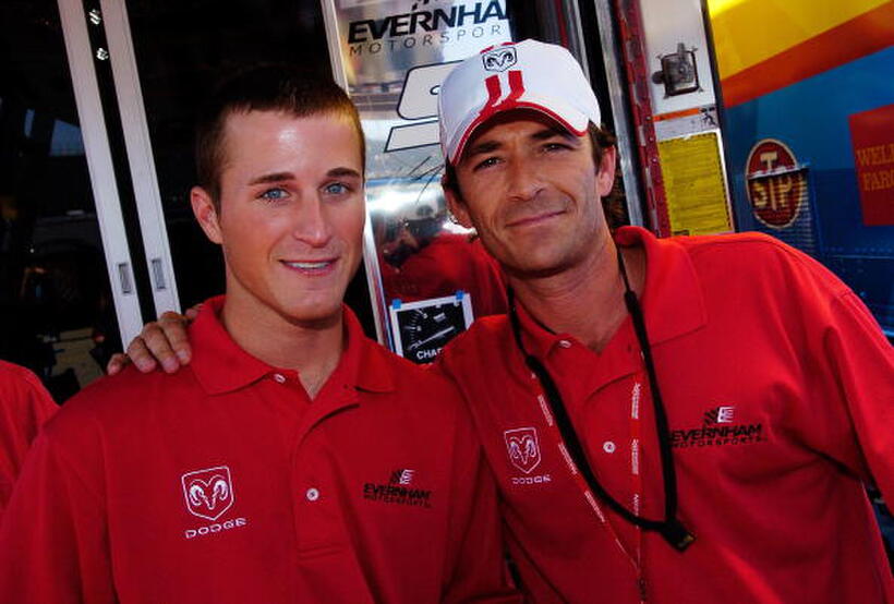 Luke Perry poses with Kasey Kahne, driver of the #9 UAW Dodge before the NASCAR Nextel Cup Series Dodge Charger 500.