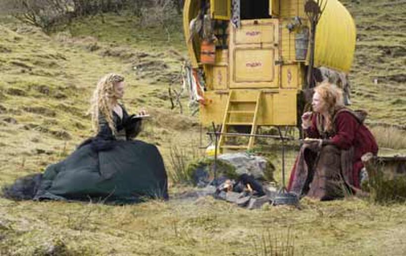 The scheming witch Lamia (Michelle Pfeiffer), conceals her true plans from Ditch Water Sal (Melanie Hill) in "Stardust."