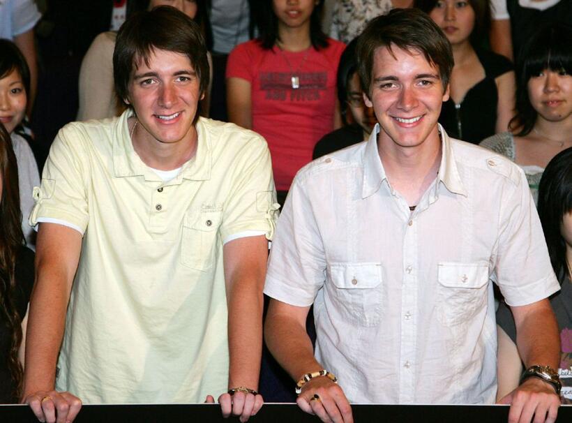 Oliver Phelps and James Phelps at the premiere of "Harry Potter And The Order Of The Phoenix."