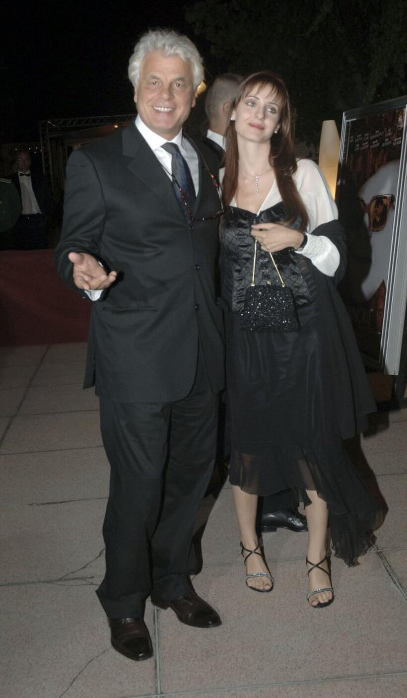 Michele Placido and Guest at the party to celebrate the opening ceremony and premiere of "The Black Dahlia" during the 63rd Venice Film Festival.