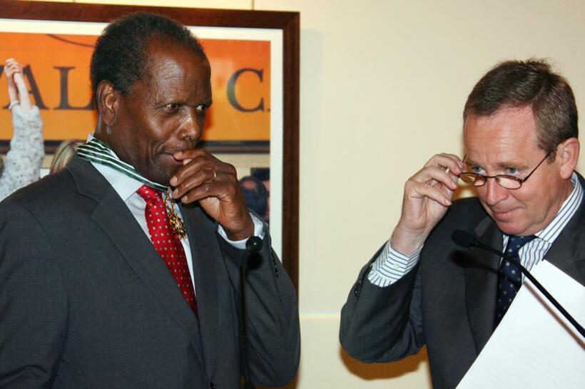 Sidney Poitier and France's Minister of Culture Renaud Donnedieu de Vabres at the 59th edition of the International Cannes Film Festival.