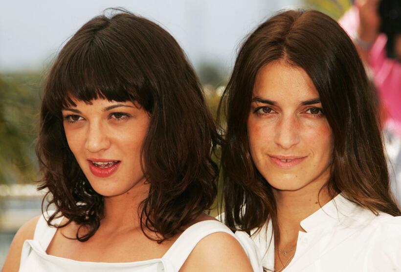 Asia Argento and Joana Preiss at the photocall of "Boarding Gate" during the 60th International Cannes Film Festival.