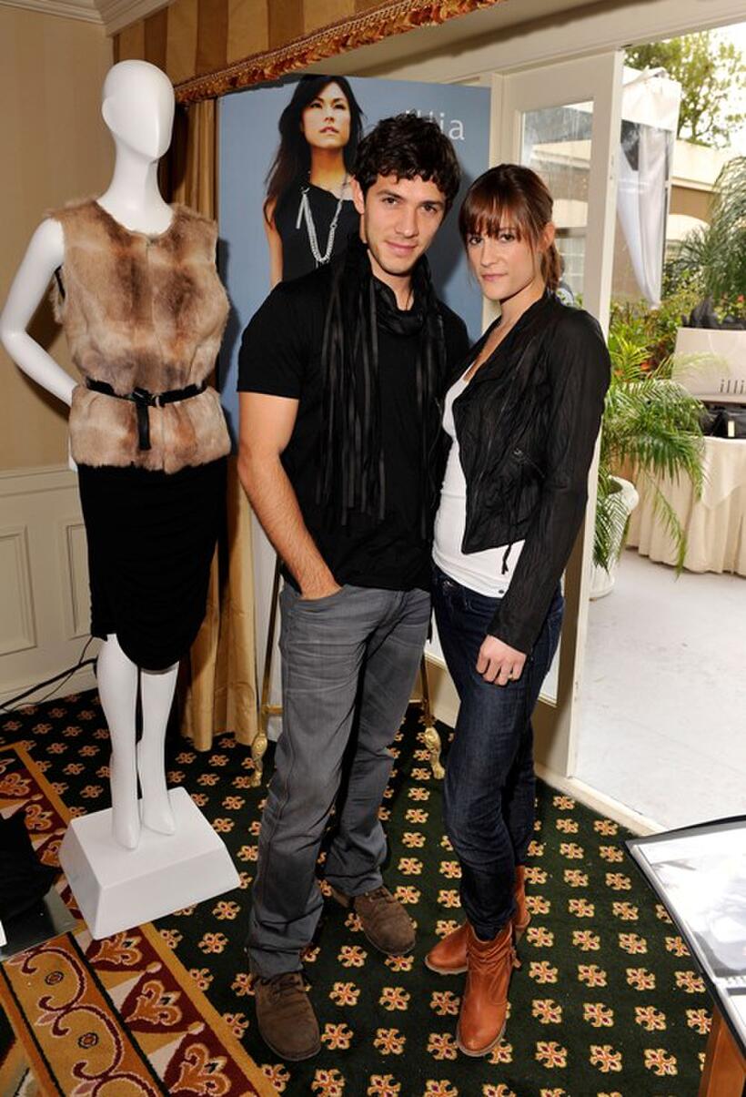 Michael Rady and Rachael Kemery at the Illia display during the 67th Annual Golden Globe Awards.
