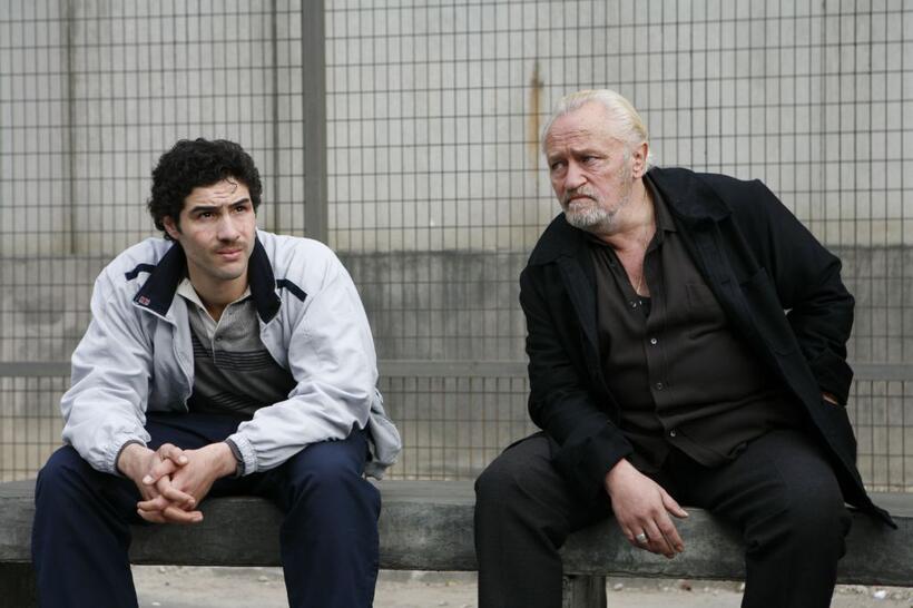 Tahar Rahim as Malik and Niels Arestrup as Cesar Luciani in "A Prophet."