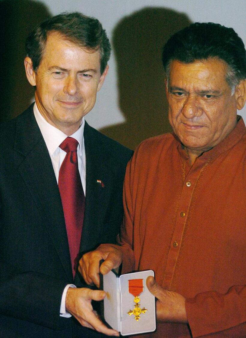 Ian Hughes and Om Puri at the Award Ceremony of "Order of the British Empire."