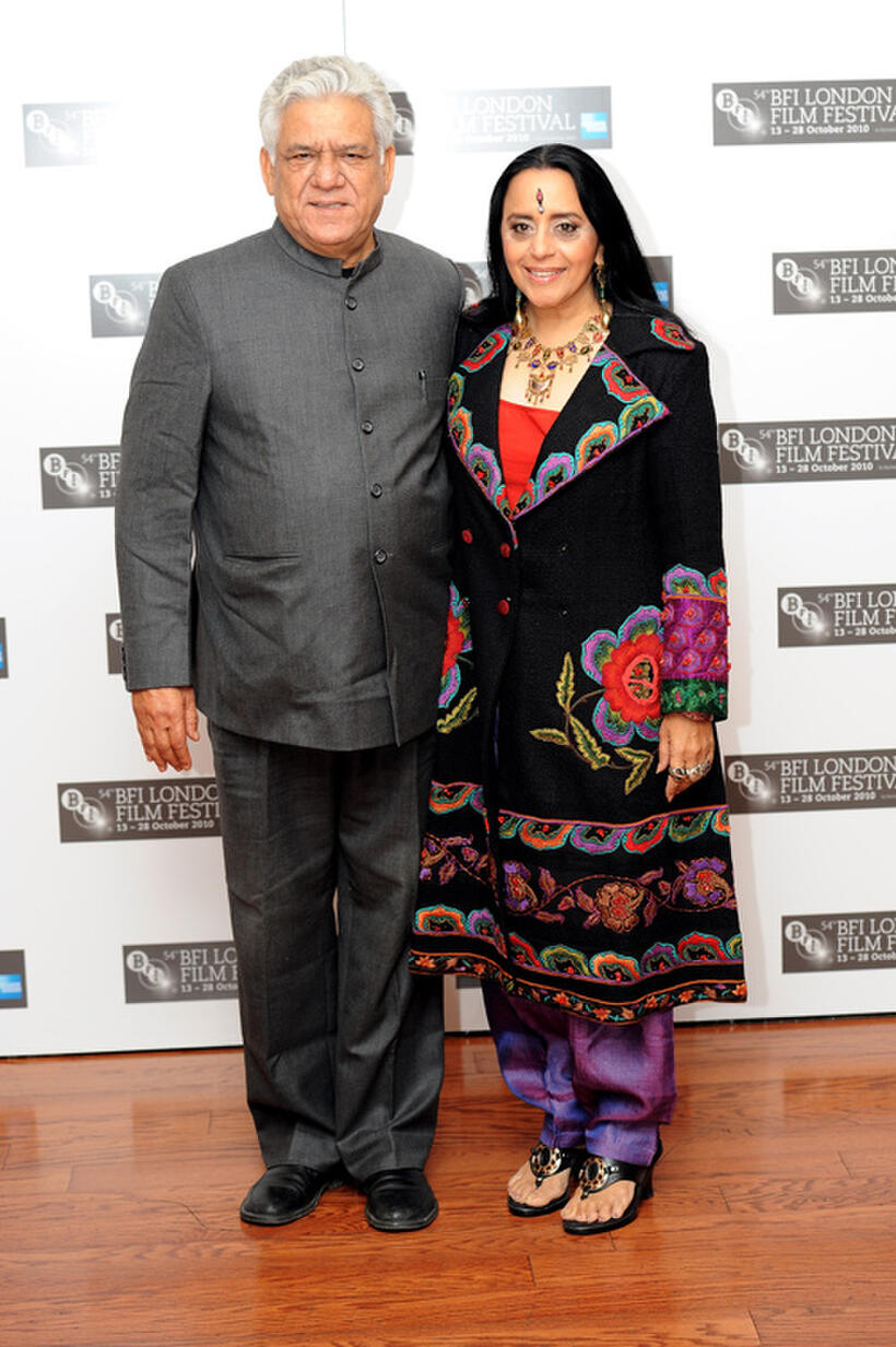 Om Puri and Ila Arun at the photocall of "West Is West" during the 54th BFI London Film Festival.