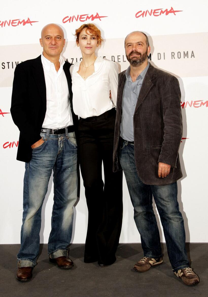 Claudio Bisio, Anita Caprioli and Giulio Manfredonia at the photocall of "Si Puo Fare" during the 3rd Rome International Film Festival.