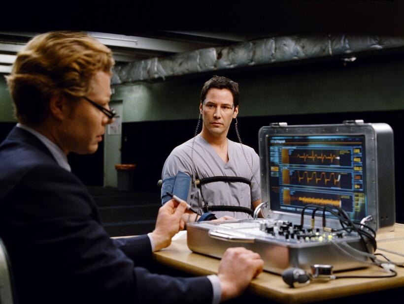Keanu Reeves as Klaatu and David Richmond-Peck as polygraph operator in "The Day the Earth Stood Still."